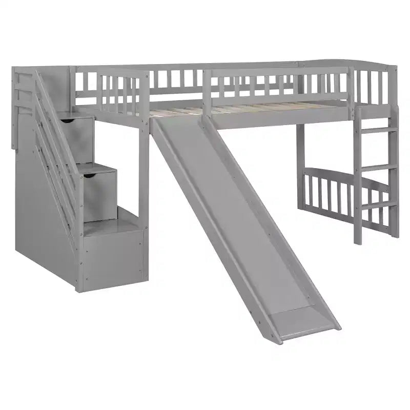 Letto a soppalco singolo con scivolo, struttura in legno con scalini contenitore e sponde di sicurezza, ideale per camerette.