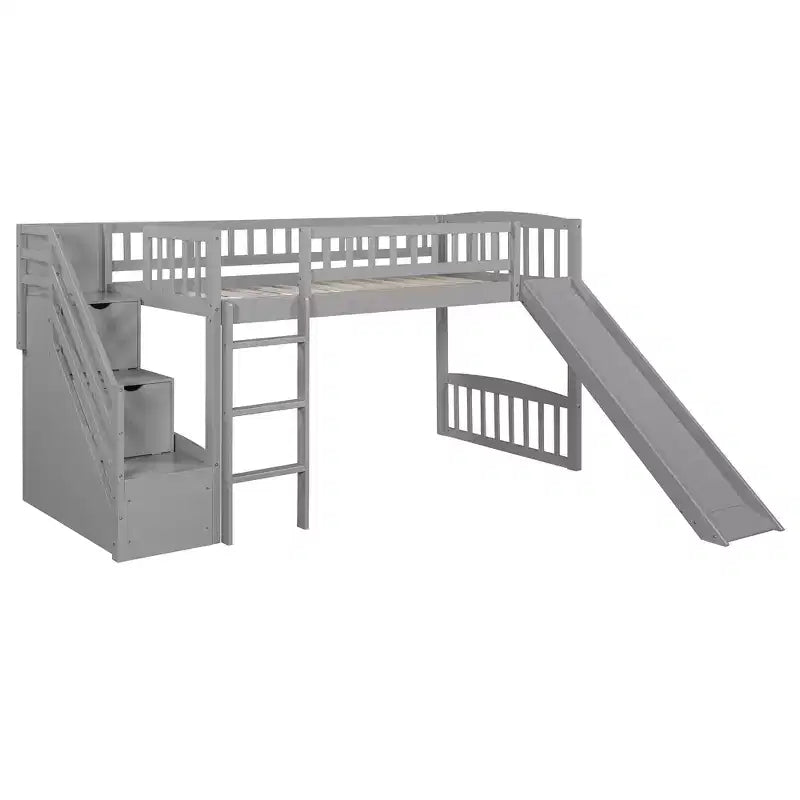 Letto a soppalco singolo con scivolo, struttura in legno con scalini contenitore e sponde di sicurezza, ideale per camerette.